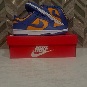 Nike men’s dunk low blue/orange
125$ negotiable 
Box included ‼️‼️